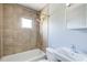 Tiled shower and bathtub in well-lit bathroom at 561 Formwalt Sw St # 6, Atlanta, GA 30312