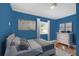 Stylish bedroom featuring hardwood floors, neutral walls, and natural light at 561 Formwalt Sw St # 6, Atlanta, GA 30312