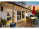 The well-lit back deck provides seamless indoor-outdoor living with an outdoor dining space at 994 Redbud Sw Ln, Atlanta, GA 30311
