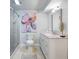 Updated bathroom featuring glass shower, stylish vanity, and modern decor at 994 Redbud Sw Ln, Atlanta, GA 30311