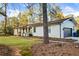 Charming home with a well-manicured lawn and attached two car garage at 994 Redbud Sw Ln, Atlanta, GA 30311