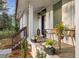 Inviting front porch with stylish seating, decor, and charming details at 994 Redbud Sw Ln, Atlanta, GA 30311