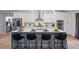 Modern kitchen with stainless steel appliances, and a large kitchen island at 994 Redbud Sw Ln, Atlanta, GA 30311