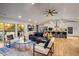 Cozy living room adjacent to a modern kitchen with stainless steel appliances at 994 Redbud Sw Ln, Atlanta, GA 30311