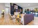 Living room featuring stylish decor, hardwood floors and an open floor plan at 994 Redbud Sw Ln, Atlanta, GA 30311