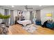 Inviting main bedroom features two large windows, plush textiles, and contemporary decor at 994 Redbud Sw Ln, Atlanta, GA 30311
