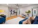 Open main bedroom features a cozy seating area, stylish decor, and ample natural light at 994 Redbud Sw Ln, Atlanta, GA 30311