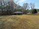Wide open backyard with a lakeside pavilion at 197 Buckhorn Dr, Temple, GA 30179