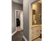 Bathroom featuring granite countertop, vanity, and modern lighting at 197 Buckhorn Dr, Temple, GA 30179