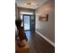 Charming foyer features wood flooring, a stylish door, and decorative accents for a welcoming feel at 197 Buckhorn Dr, Temple, GA 30179