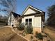 Attractive exterior highlighting beautiful landscaping, decorative rock, and a charming one story home at 197 Buckhorn Dr, Temple, GA 30179