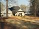 Quaint exterior view of home featuring well-maintained lawn, attached garage, and inviting entrance at 197 Buckhorn Dr, Temple, GA 30179