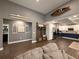 Spacious living room showcases high ceilings and seamlessly connects to a modern, stylish kitchen at 197 Buckhorn Dr, Temple, GA 30179