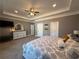Spacious main bedroom features a tray ceiling, plush carpet, and ample natural light at 197 Buckhorn Dr, Temple, GA 30179