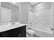 Clean bathroom with a modern vanity, white toilet, and shower-tub combination at 2094 Callaway Nw Ct, Atlanta, GA 30318