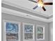 Bedroom with 3 windows allowing for great natural light and a ceiling fan at 2094 Callaway Nw Ct, Atlanta, GA 30318