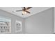 Bright bedroom with neutral gray walls and trim with a ceiling fan and two windows at 2094 Callaway Nw Ct, Atlanta, GA 30318