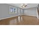 The living room features hardwood floors, great natural light and modern ceiling fan at 2094 Callaway Nw Ct, Atlanta, GA 30318