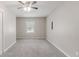 Bedroom with fresh light gray carpet, a window, and a closet at 332 Cheryl Ct, Jonesboro, GA 30238