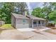 Charming one-story home featuring a cozy front porch, siding, and a well-maintained lawn at 332 Cheryl Ct, Jonesboro, GA 30238