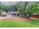 Charming single-story home with a cozy front porch and a well-maintained lawn at 332 Cheryl Ct, Jonesboro, GA 30238