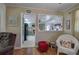 Living room with hardwood floors and view into the kitchen at 1122 Byers Sw Dr, Marietta, GA 30060