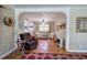Charming living room with hardwood floors, archway, and neutral wall color at 1122 Byers Sw Dr, Marietta, GA 30060