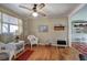 Sunlit living space featuring hardwood floors and vintage decorations at 1122 Byers Sw Dr, Marietta, GA 30060