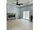 Cozy living area with a modern fireplace, sliding glass doors to a patio, and natural light at 135 Yancey Rd, Covington, GA 30014