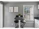 Cute breakfast nook featuring a high-top table and stools near a bright window at 1911 Woodland Hills Nw Ave, Atlanta, GA 30318