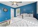 Cozy main bedroom featuring a comfortable bed, natural light, and stylish decor creating a peaceful retreat at 1911 Woodland Hills Nw Ave, Atlanta, GA 30318