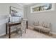 Comfortable office with a neutral palette, featuring desk, bench seating, and a window with a view at 1911 Woodland Hills Nw Ave, Atlanta, GA 30318
