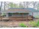 A weathered wood deck adds character to this home's outdoor space at 3841 Greenbrook Dr, Douglasville, GA 30135