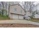 Charming two-story home featuring a two-car garage and a welcoming entrance at 3841 Greenbrook Dr, Douglasville, GA 30135