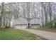 Charming two-story home featuring a two-car garage and a welcoming entrance at 3841 Greenbrook Dr, Douglasville, GA 30135