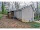 Beige siding and a brown deck highlight this single-Gathering home's backyard at 3841 Greenbrook Dr, Douglasville, GA 30135
