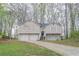 Charming two-story home featuring a two-car garage and a welcoming entrance at 3841 Greenbrook Dr, Douglasville, GA 30135