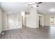 Bright, open-concept living room with modern flooring and plenty of natural light at 3841 Greenbrook Dr, Douglasville, GA 30135