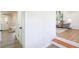 Stylish entryway with wood floors and open access to the living area at 1749 Lauranceae Way, Riverdale, GA 30296