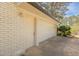 This garage is attached with a door for access from the backyard at 1749 Lauranceae Way, Riverdale, GA 30296