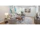 Cozy living room featuring neutral colors, plush seating, and natural light at 1749 Lauranceae Way, Riverdale, GA 30296