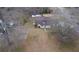 An aerial view of a single-story home with a front porch and a traditional, well-maintained lawn at 2326 Noahs Ark Rd, Jonesboro, GA 30236