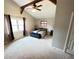 Large bedroom with high ceilings and a large bed, plus decor at 2326 Noahs Ark Rd, Jonesboro, GA 30236