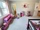 bedroom featuring plush carpet, decor, and plenty of room to play at 2326 Noahs Ark Rd, Jonesboro, GA 30236