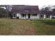 Charming single-story home featuring a cozy front porch and a traditional, well-maintained lawn at 2326 Noahs Ark Rd, Jonesboro, GA 30236