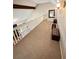 Second floor hallway featuring carpet and workout area at 2326 Noahs Ark Rd, Jonesboro, GA 30236