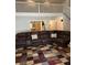 Spacious living room featuring an open concept with hardwood floors and cozy carpet at 2326 Noahs Ark Rd, Jonesboro, GA 30236