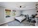 Bedroom featuring a ceiling fan, windows with blinds, and a comfortable space for relaxing at 2810 Burgundy Dr, Cumming, GA 30041