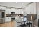 Updated kitchen features stainless steel appliances, granite countertops, and lots of cabinet space at 2810 Burgundy Dr, Cumming, GA 30041