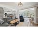Spacious living room with an open floor plan, bright natural light, and modern decor at 2810 Burgundy Dr, Cumming, GA 30041